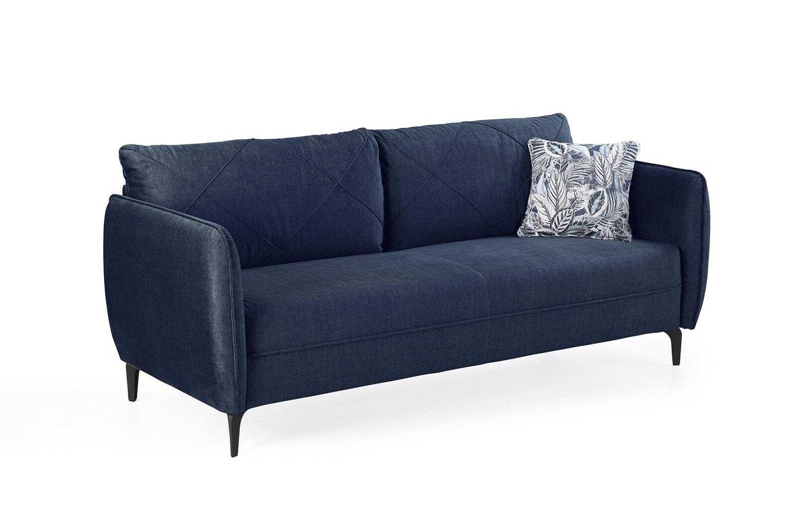 Dunkelblaue 3-Sitzer Schlafcouch Novara mit samtiger Veloursoptik, floralem Jaquardmuster auf den Kissen, anthrazitfarbenen Metallfüßen und geteilter Rückenlehne für die ausziehbare Liegefläche.