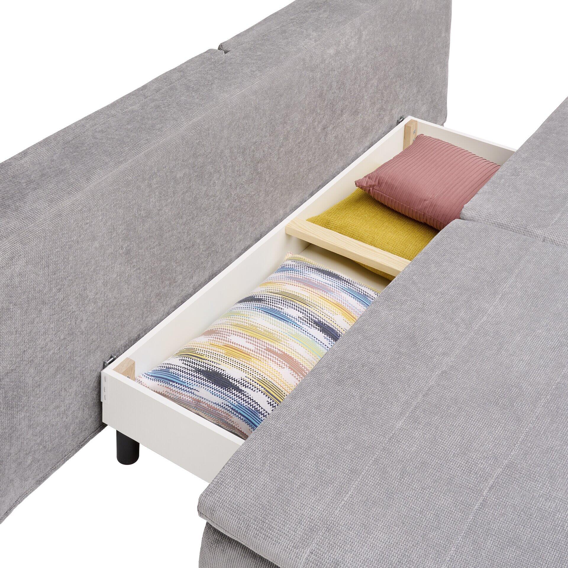 Boxspringsofa Melly mit ausgezogener Schublade und Stauraum für Kissen.