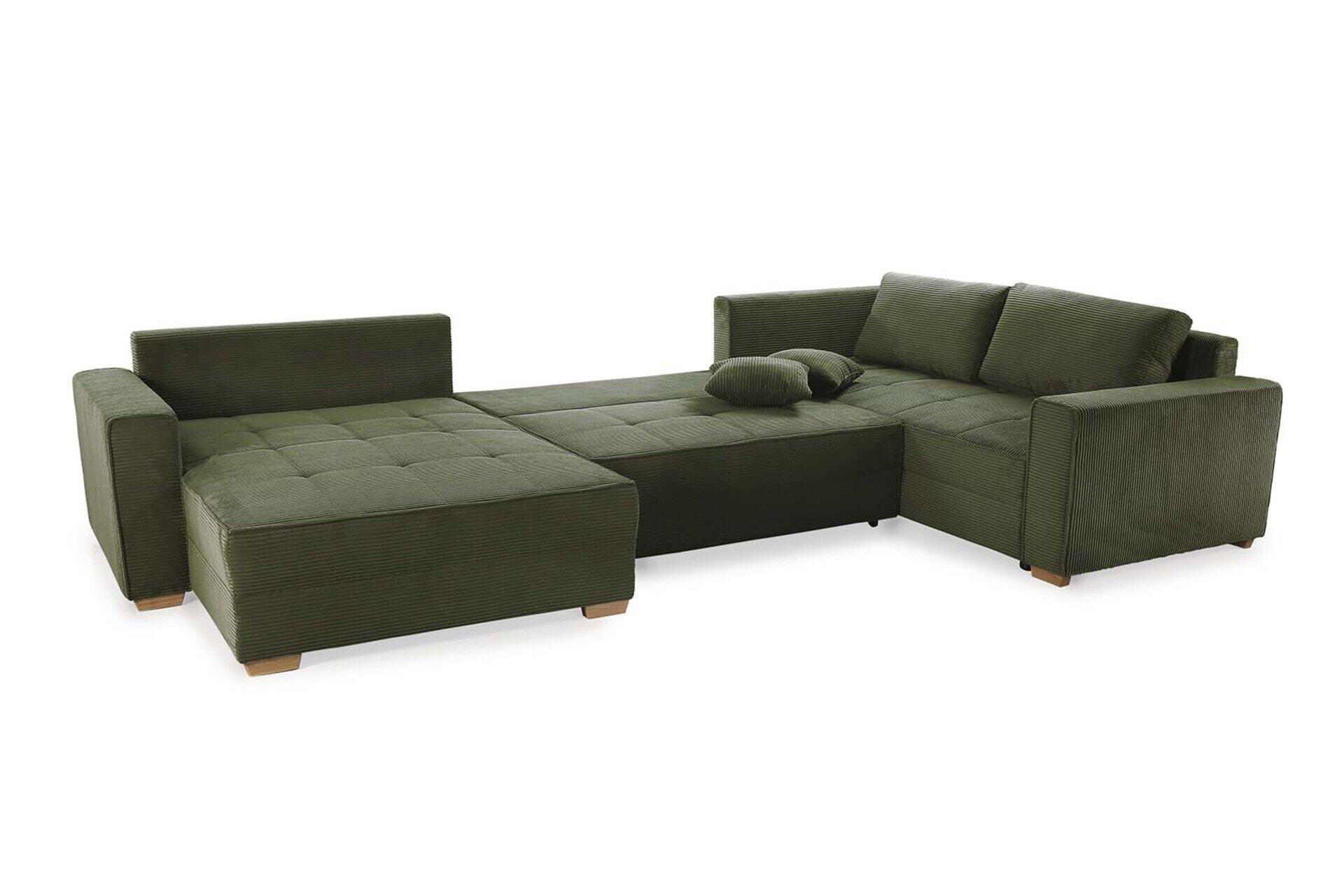 Wohnlandschaft Brixen mit dunkelgrünem Cordstoffbezug und integrierter Chaiselongue für eine komfortable Liegeposition, gezeigt in einer Frontalansicht mit Raumkontext.