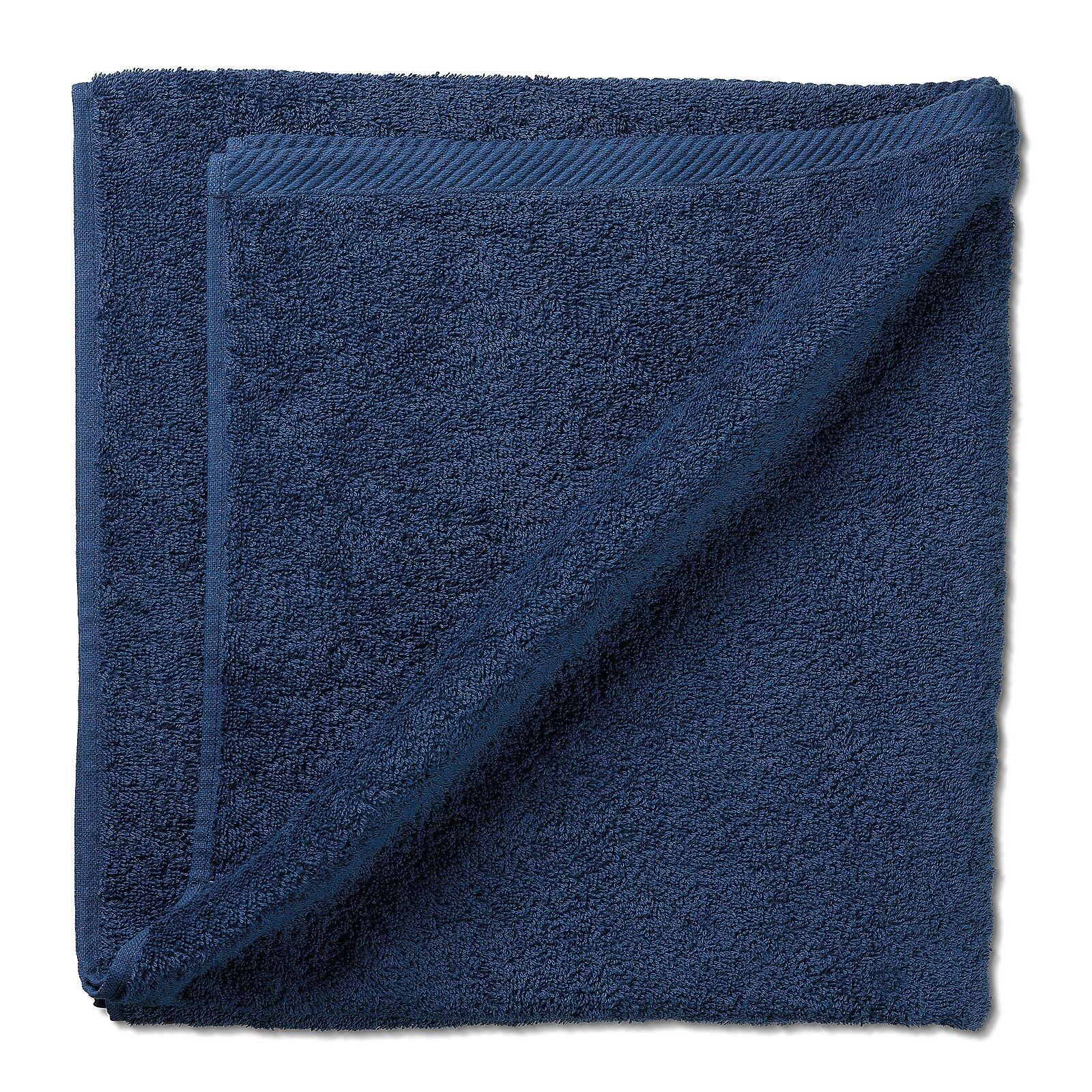 Dunkelblaues Duschtuch Ladessa mit flauschiger Textur und hellblauer Kante, dargestellt auf weißem Hintergrund.