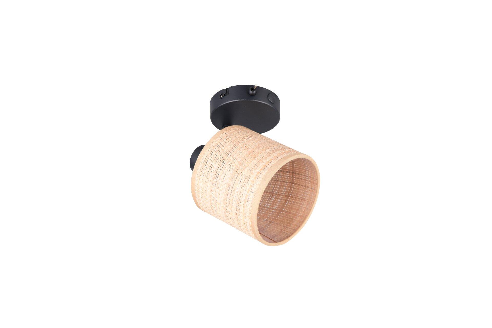 Schwenkbare Wandleuchte Strahler Aimee mit schwarzem Wandanschluss und naturfarbenem, texturiertem Rattan-Leuchtenkopf, Detailaufnahme aus Vogelperspektive.