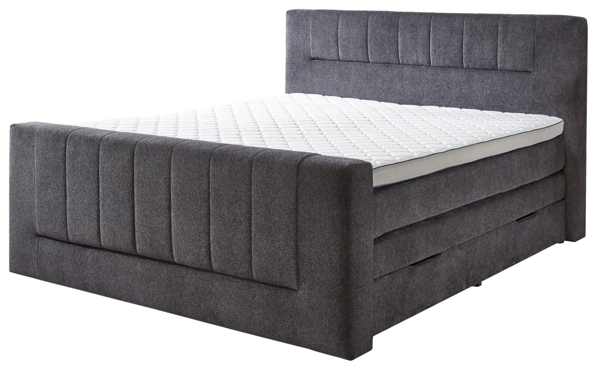 Boxspringbett Kenosha BX2450 in Seitenperspektive mit grauem Kopfteil, Bettkasten und offenem Stauraum.