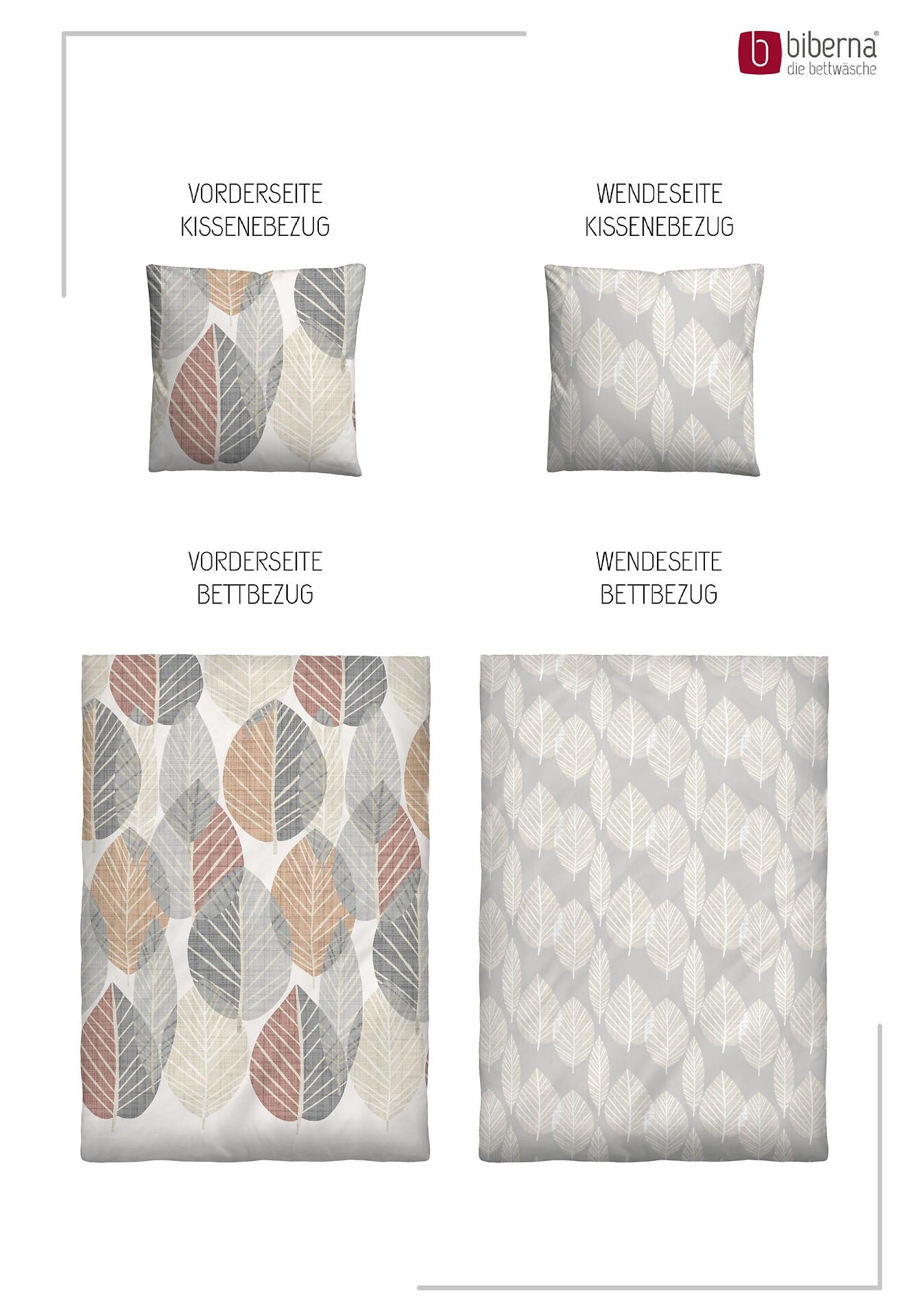 Biberna Kissenbezüge mit floralem Motivdruck und schlichtem Design auf grauen Rückseiten, die die Wendefunktion zeigen.
