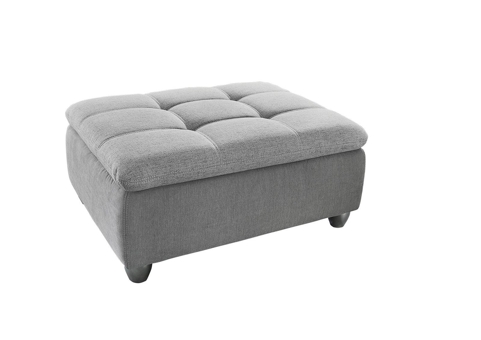 Grauer Hocker Genua mit Stauraum, abgerundeten Kanten und Quastenmuster auf der Sitzfläche, Ansicht von der Seite.