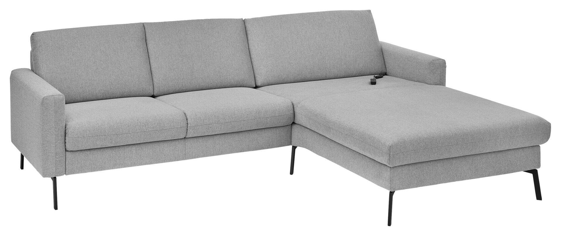 Graue Eckcouch MR XP 01 mit abnehmbarer Kopfstütze, integriertem Fernseher und schwarzen Metallfüßen, in einer schrägen Perspektive.