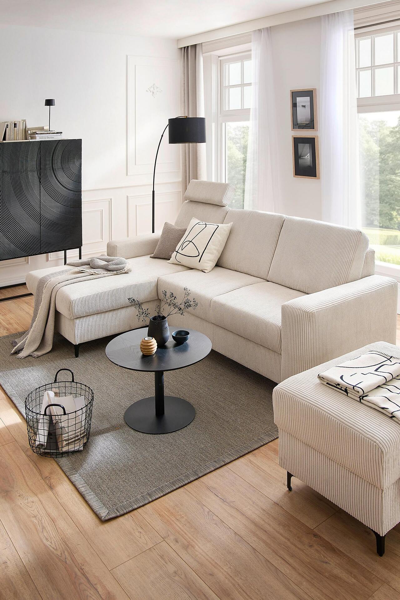 Ecksofa Balina mit L-Form und ausgezogener Schlaffunktion, Blickwinkel von der Seite.