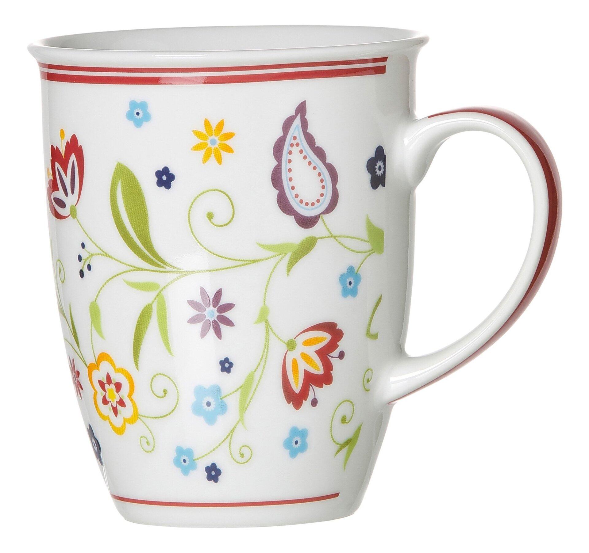 Kaffeebecher Shanti von Ritzenhoff & Breker mit farbenfrohem, floralem Muster und Henkel, aus der Seitenperspektive dargestellt.