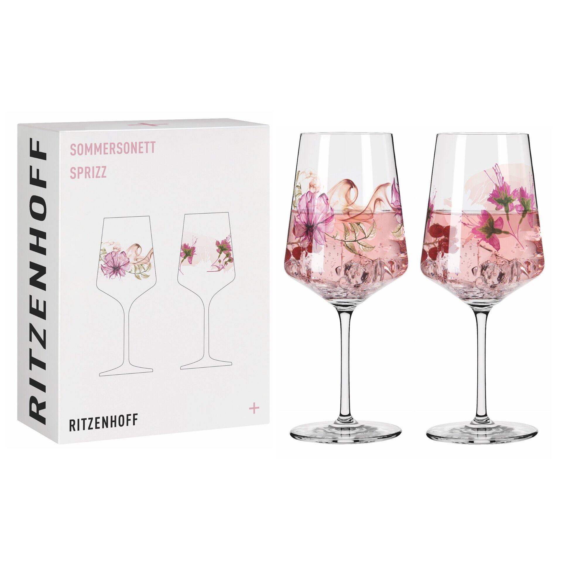 Zwei elegante Aperitifgläser mit floralem Dekor in Rosenfarben, dargestellt in Frontalperspektive auf einer weißen Unterlage, in einer Geschenkbox von RITZENHOFF Sommersonnett.