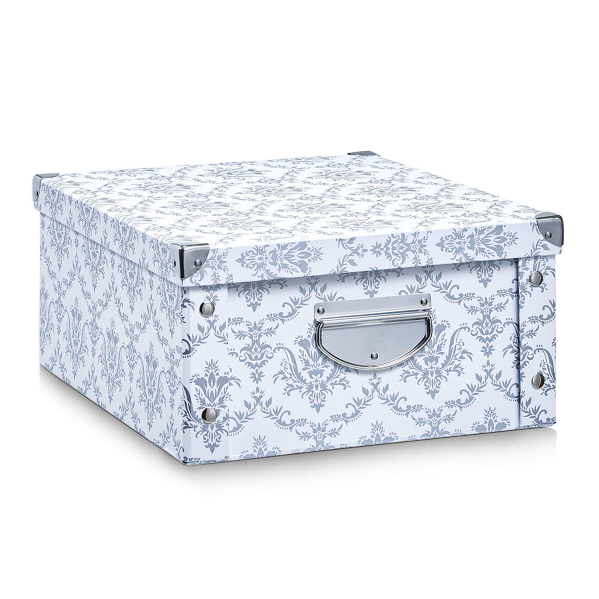 Aufbewahrungsbox mit blauem Muster, silbernem Griff und Metallverstärkungen, fotografiert aus der Vogelperspektive.