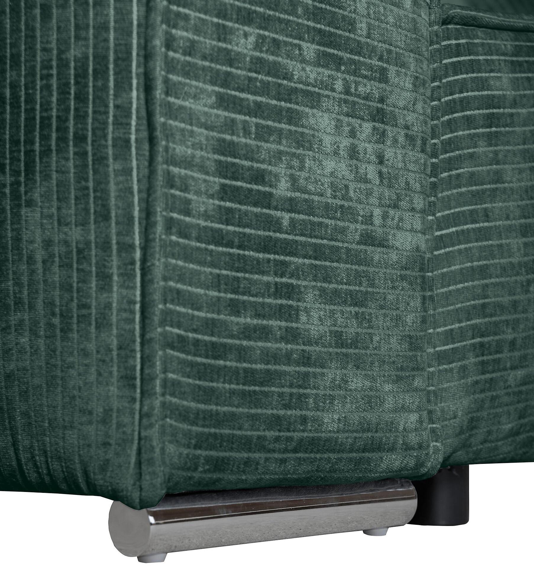 Bigsofa Sky: Detailaufnahme der Rückenlehne mit strukturierter Oberfläche und chromfarbenen Metallfüßen.