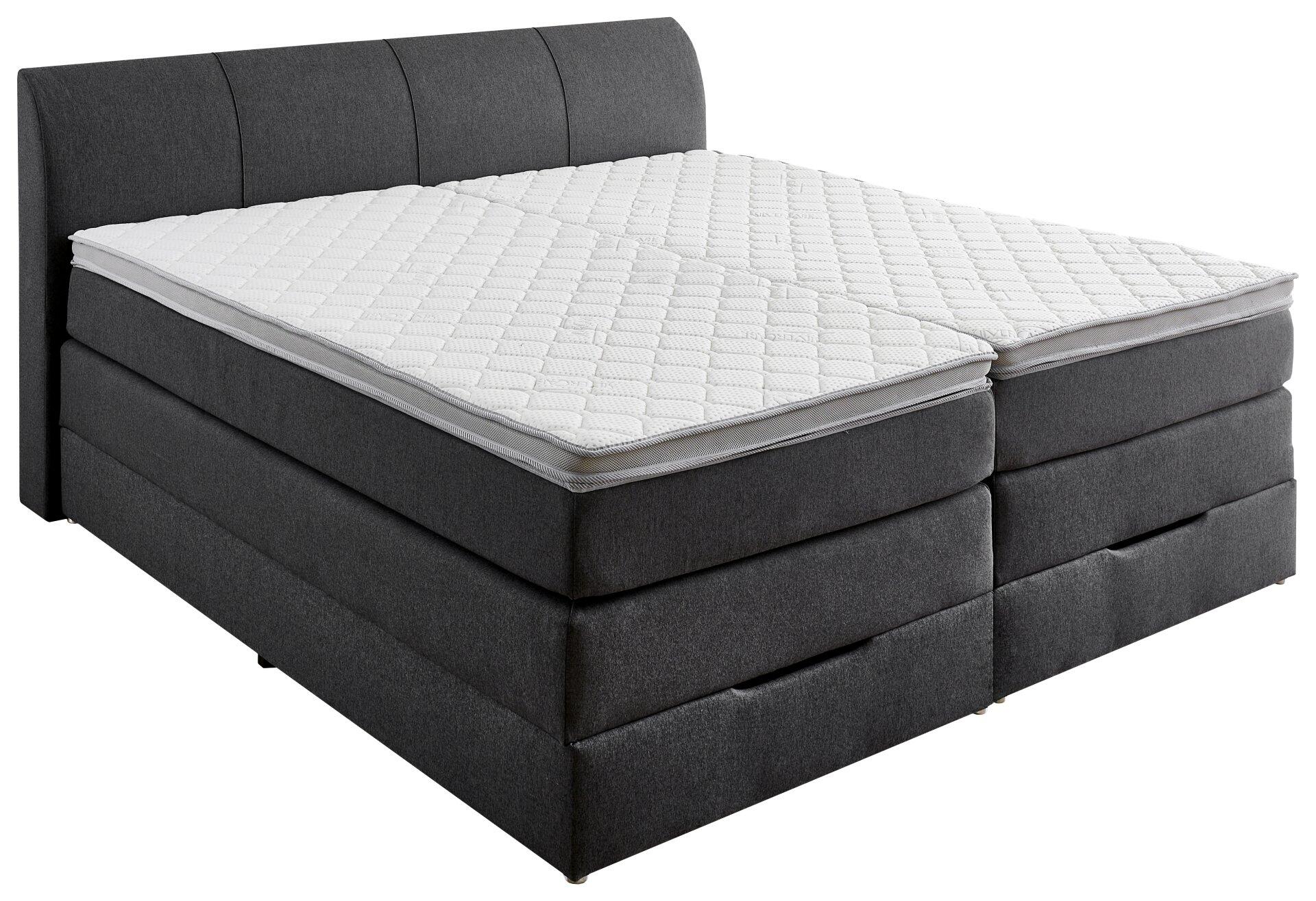 Boxspringbett Modesto BX1440 mit dunkelgrauem Stoffbezug, leicht gewölbtem Kopfteil und integrierten Schubladen für Stauraum.