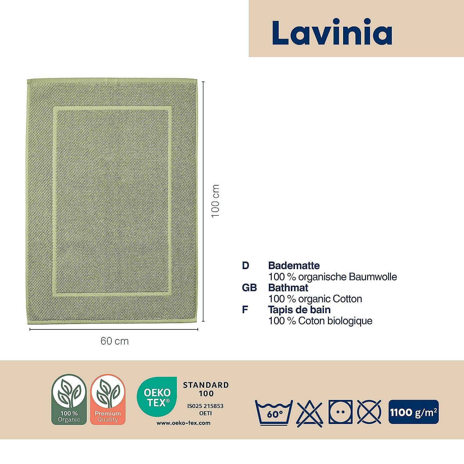 Grüner Badvorleger Lavinia mit strukturierter Wabenoptik und den Abmessungen 60 cm x 100 cm, inklusive Detailansicht von Waschhinweisen, Materialangabe und OEKO-TEX® Siegel.