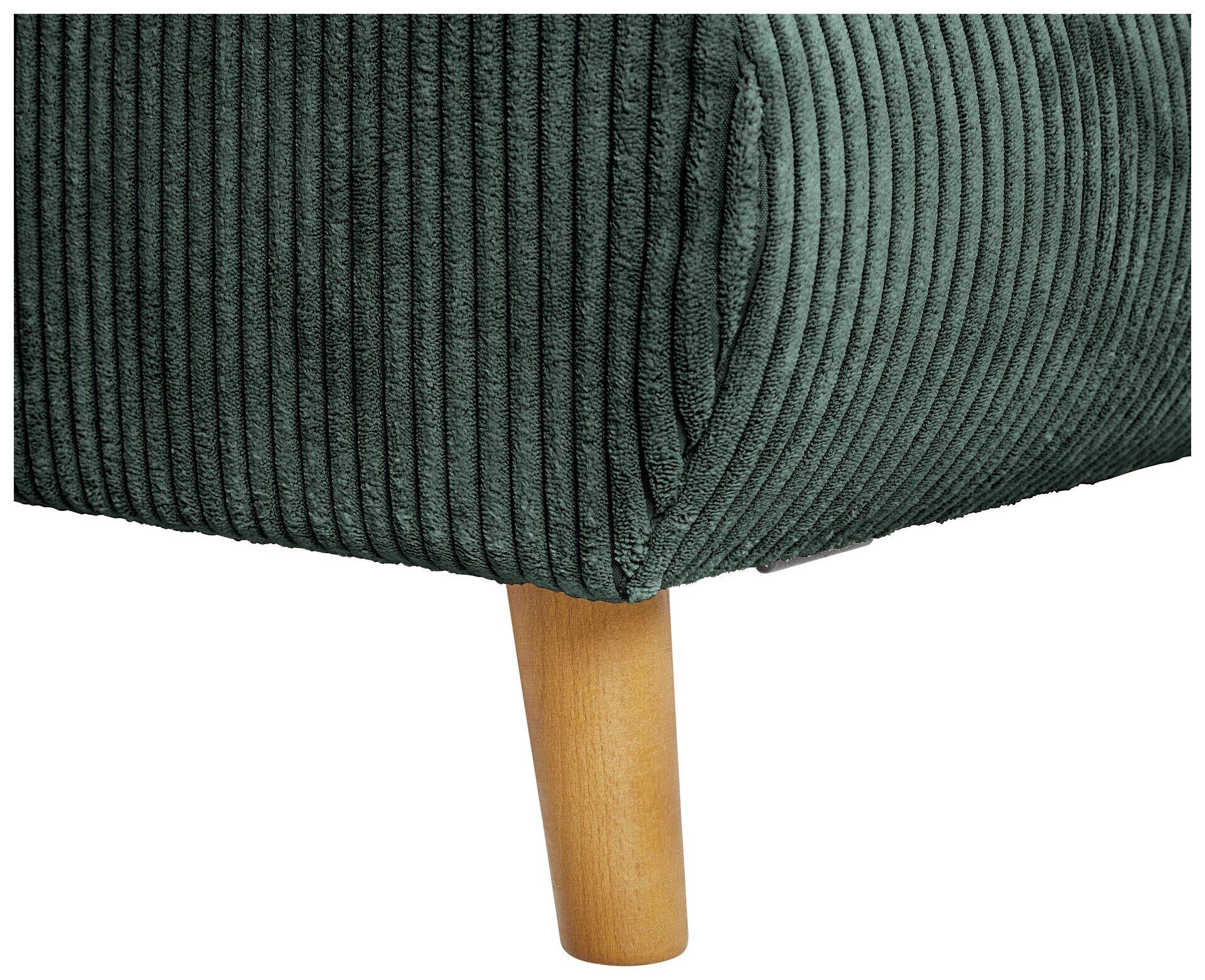 Detailaufnahme des dunkelgrünen, samtbezogenen Rückenkissens des Ecksofas Santana mit konischem Eichenholzfuß.