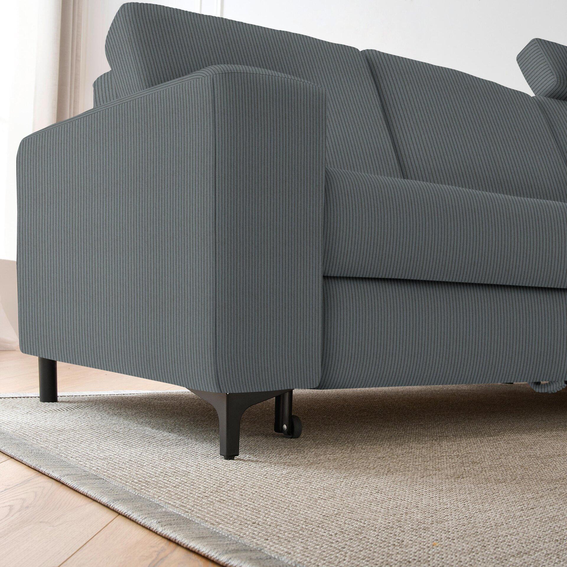 Graues Ecksofa Balina mit hochgesteppter Rückenlehne, Winkelfüßen mit Rollen und Schlaffunktion, Detailansicht von der Seite.