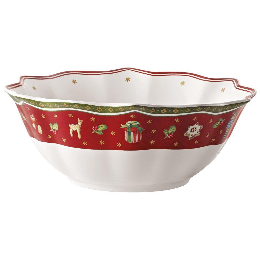 Weißes Weihnachts-Bowl "Toy's Delight" von Villeroy & Boch mit verziertem Rand aus roten Streifen, grünen Blättern, goldenen Sternen und zusätzlichen goldenen Akzenten.