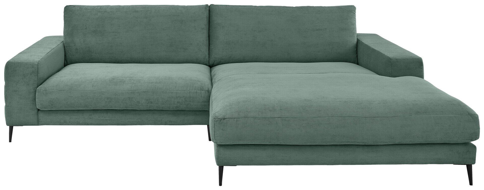 Grünes Ecksofa Badia Base 2.0 mit abgerundeten Formen und Longchair-Funktion, dargestellt aus Frontalperspektive mit schwarzem Metallfuß und strukturierter Stoffoberfläche.