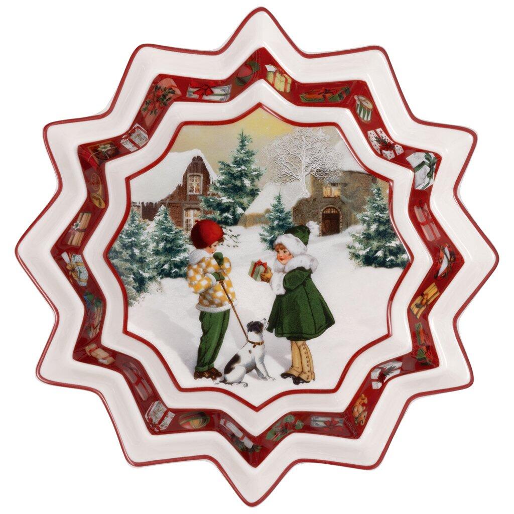 Weihnachtliche Schale "Überraschung" von Villeroy & Boch mit abgerundeter Form und detaillierter Innenszene von Kindern vor einer verschneiten Landschaft.
