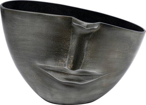 Detailaufnahme der handgefertigten Vase "Half Face Anthrazit" mit einer abstrakten, gesichtartigen Darstellung aus lackiertem Aluminium, die von unten eine geschwungene Form und strukturierte Wangenpartien zeigt.