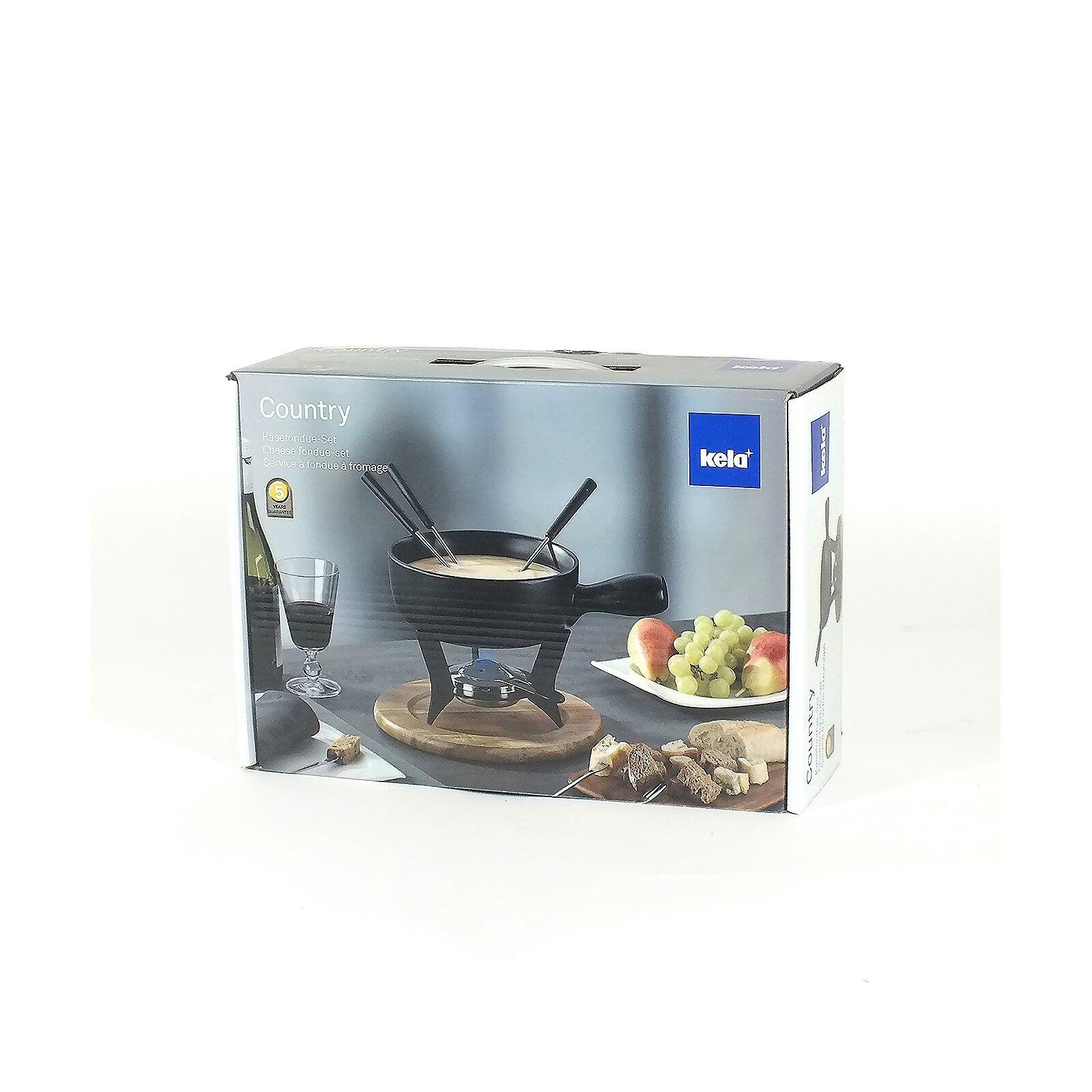 Käsefondue-Set "Country" mit schwarzem Fondue-Topf und Griffen, präsentiert auf einer Holzunterlage mit Früchten und Brot.