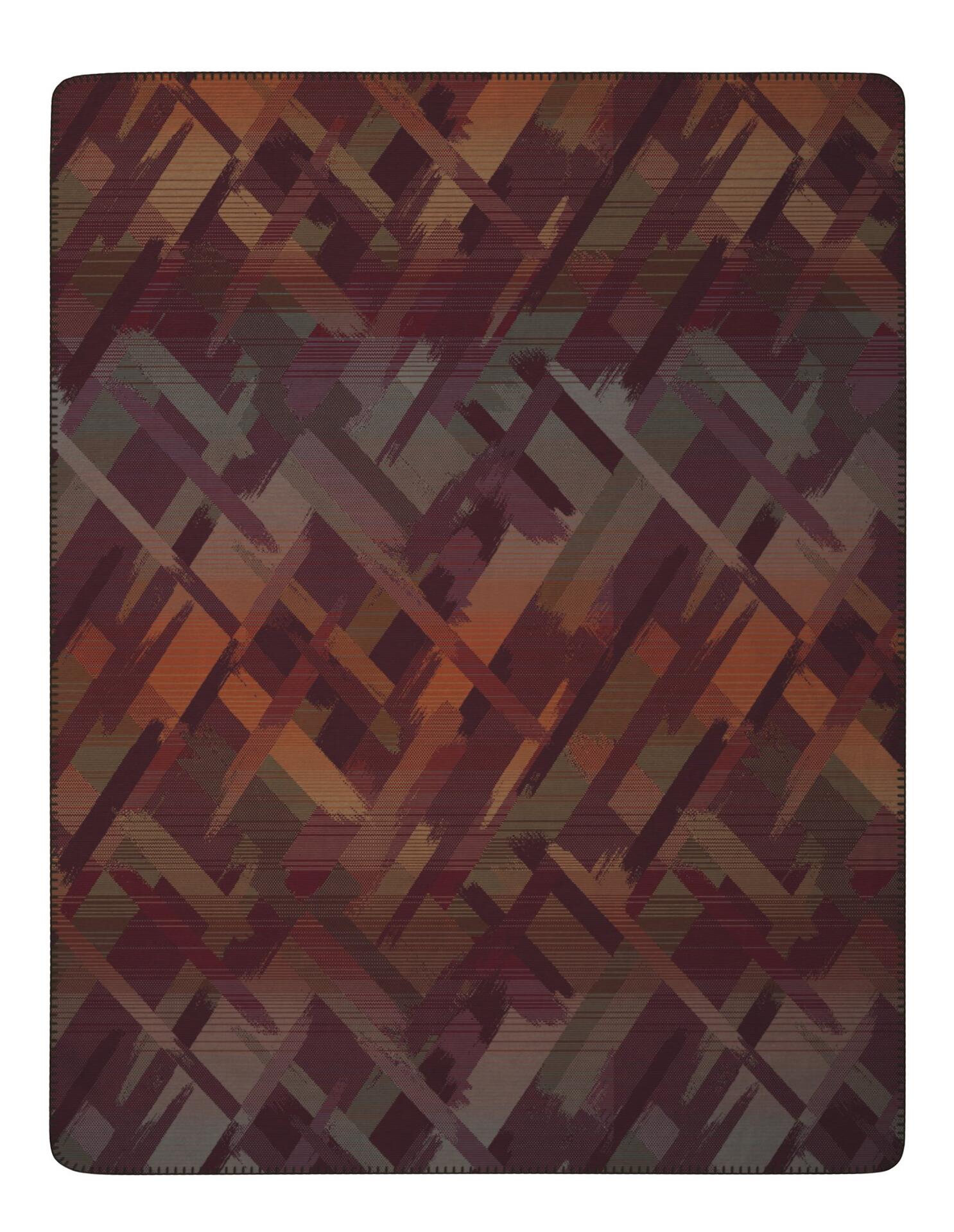 Nahaufnahme der Textur der Wohndecke garnet glow mit einem Muster aus diagonalen Linien und Rottönen.