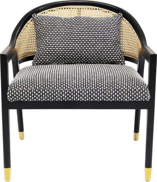 Sessel Horizon mit schwarzem Holzrahmen, goldenen Füßen, Rattan-Rückteil und strukturmuster-bezogenem Kissen.