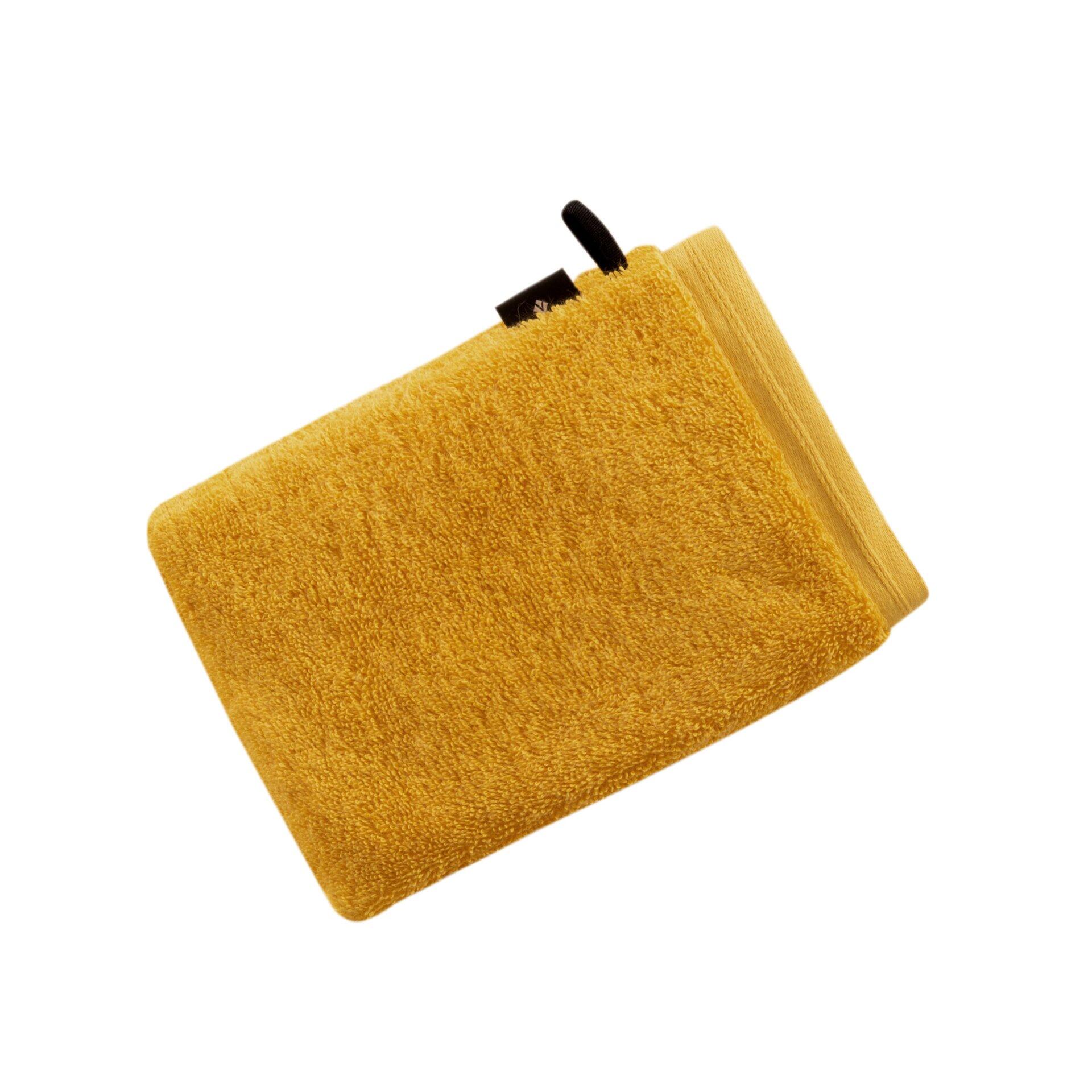 Gelbes Waschhandschuh Vegan Life aus dicht gewebter, supersofter Baumwolle mit schwarzem Bändchen, dargestellt auf weißem Untergrund, wobei die Frottee-Struktur und die Materialstärke erkennbar sind.