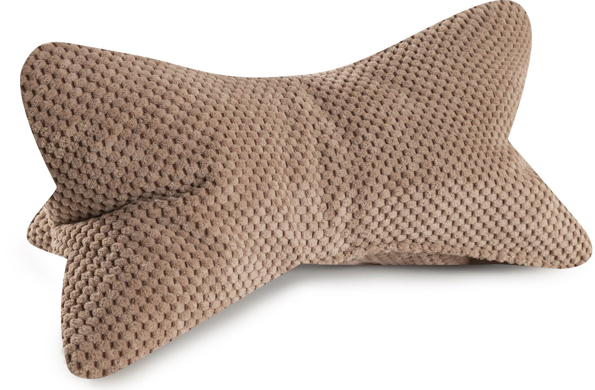 Detailaufnahme des Leseknochen Comodo Nackenkissens mit ergonomischer, herz-ähnlicher Form und strukturierter Oberfläche.