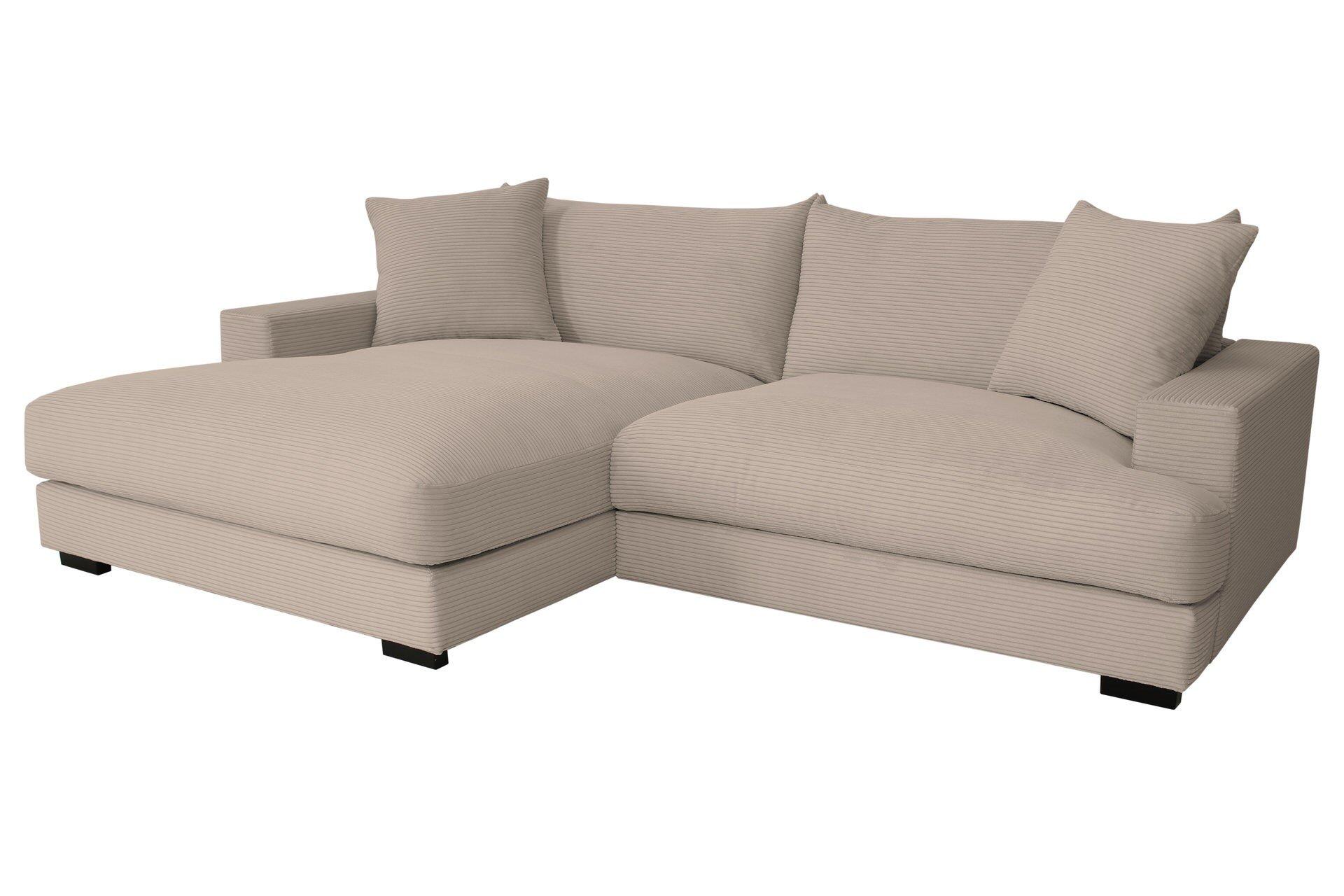 Hellecke PELLE mit Bettfunktion, abgebildet aus der Seitenperspektive, zeigt die niedrige Sitzfläche, hohen Armlehnen und die ausfahrbare Liegefläche.