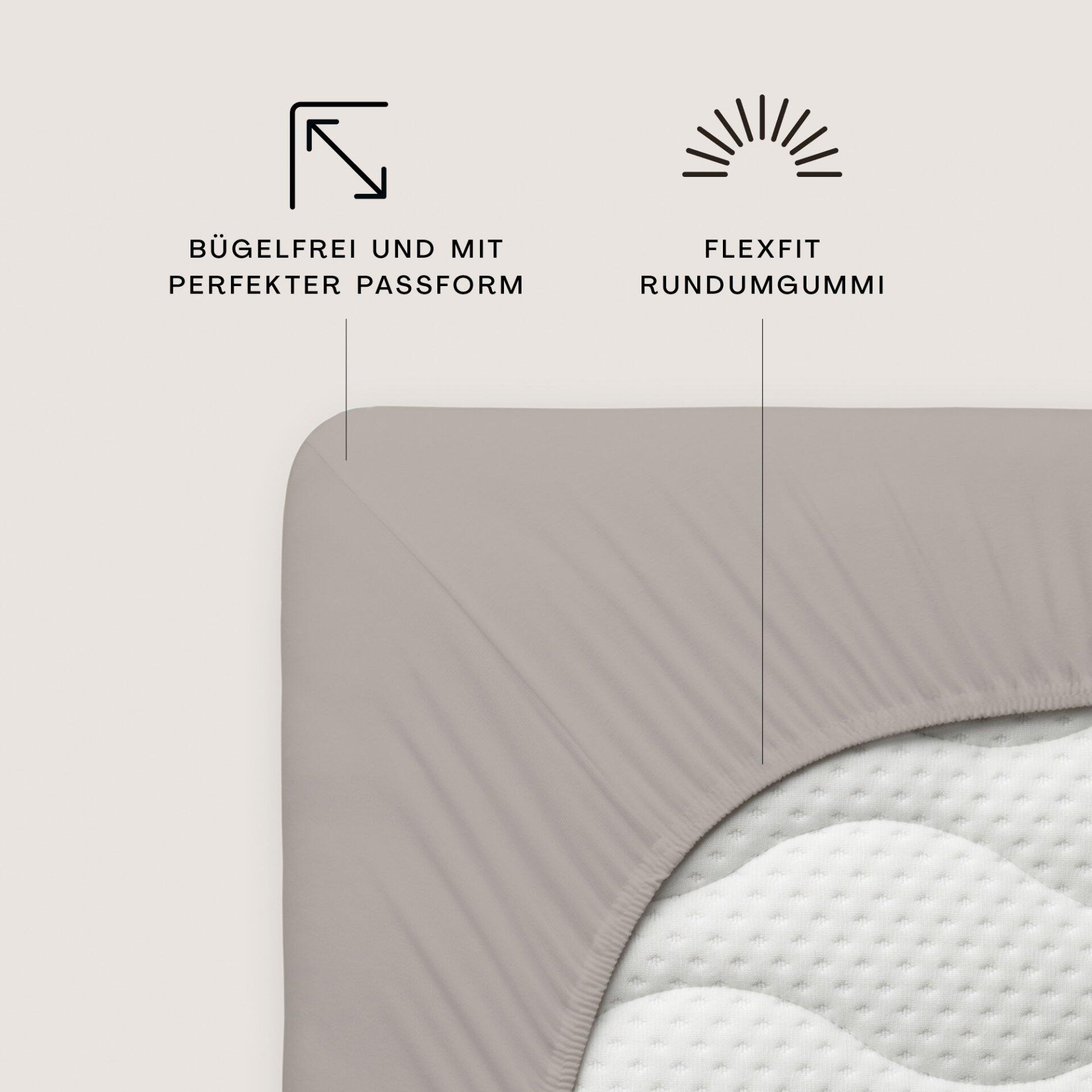 Mako-Jersey Spannbettuch Sand Mid: Detailaufnahme der weichen, strukturierten Oberfläche mit gewebter Prägung und Rundgummi für optimale Passform.