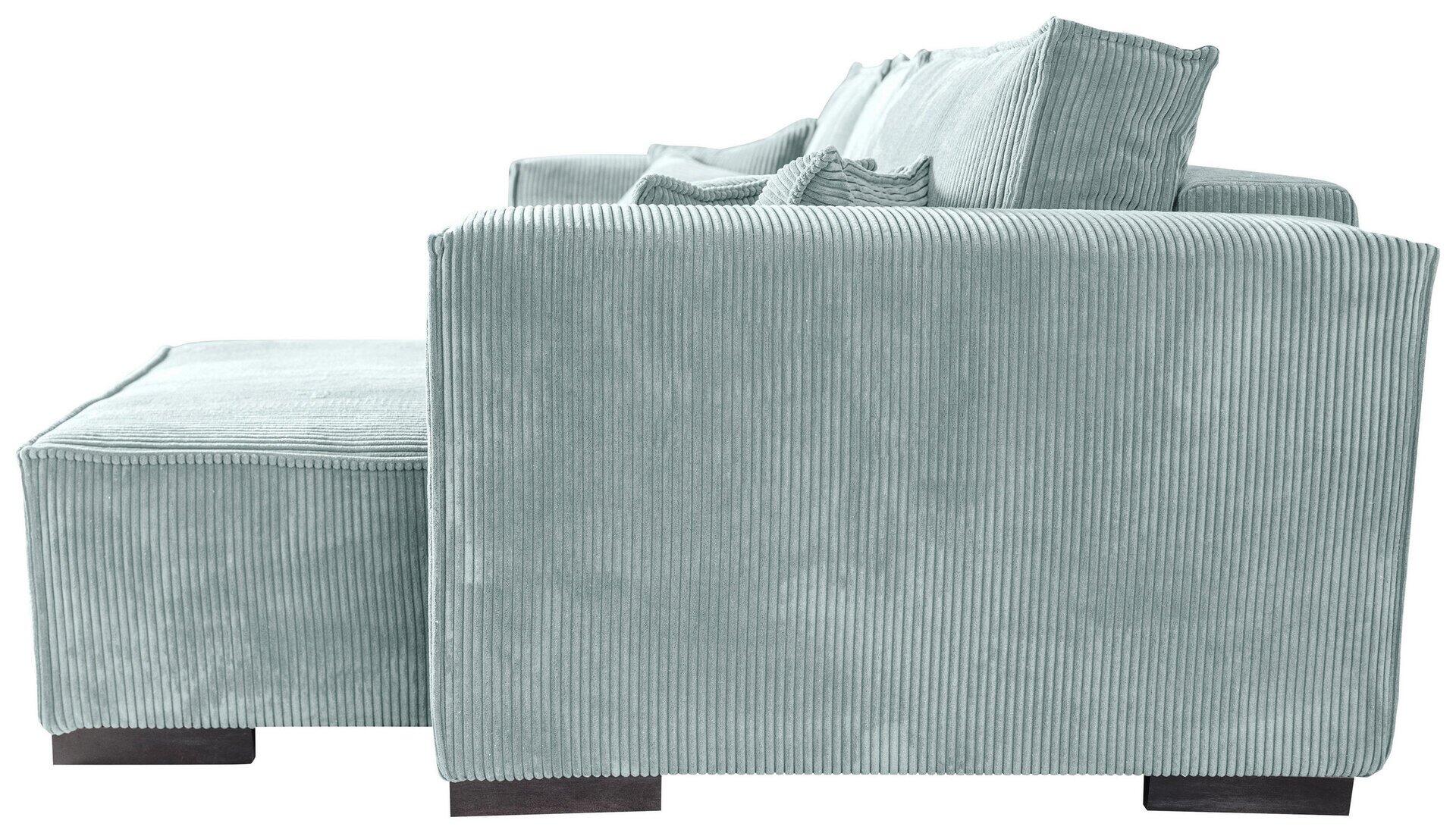 Ecksofa Mango: Detailaufnahme eines Eckteils mit Fußteil aus grau-blauem Cord, schmalen braunen Füßen und einem dekorativen Kissen, aus seitlicher Perspektive erkennbar.