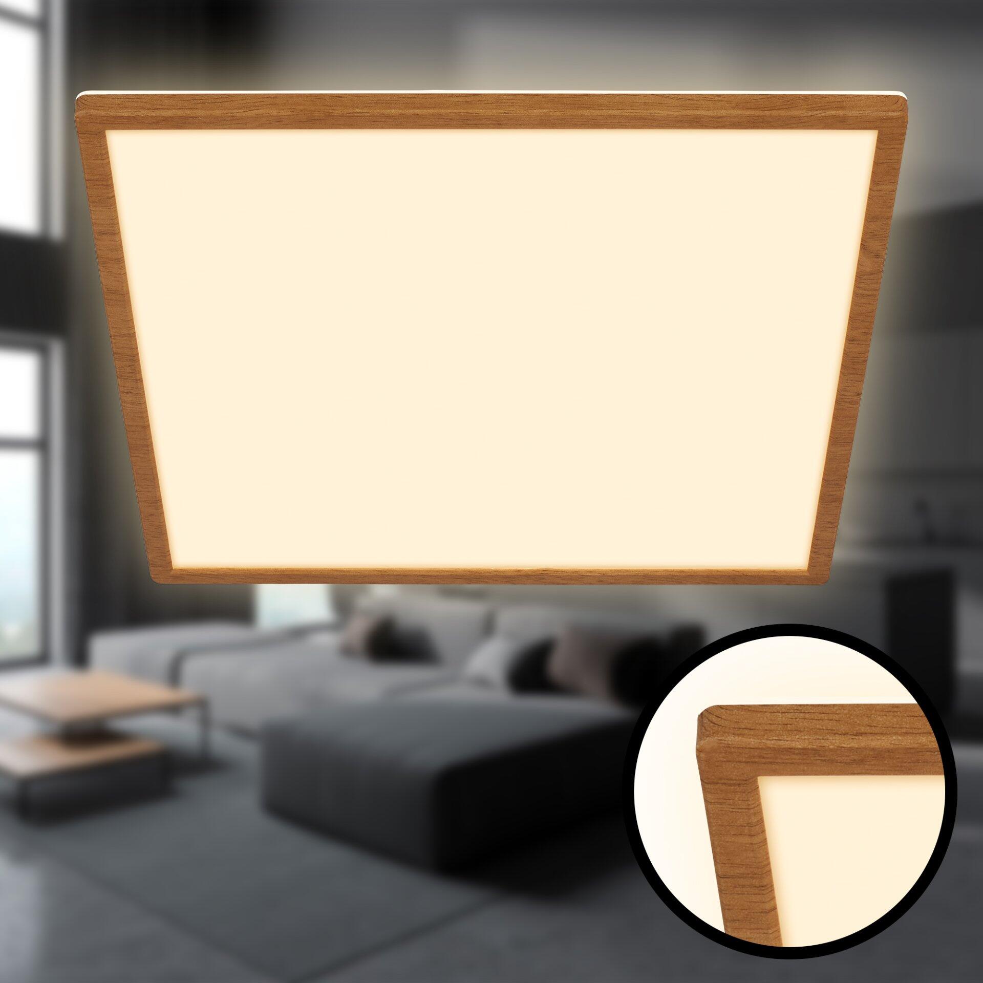 Hängende Wandleuchte Panel Tava Wood mit rechteckigem Design und Holzrahmen, die sanft warmes Licht abgibt.