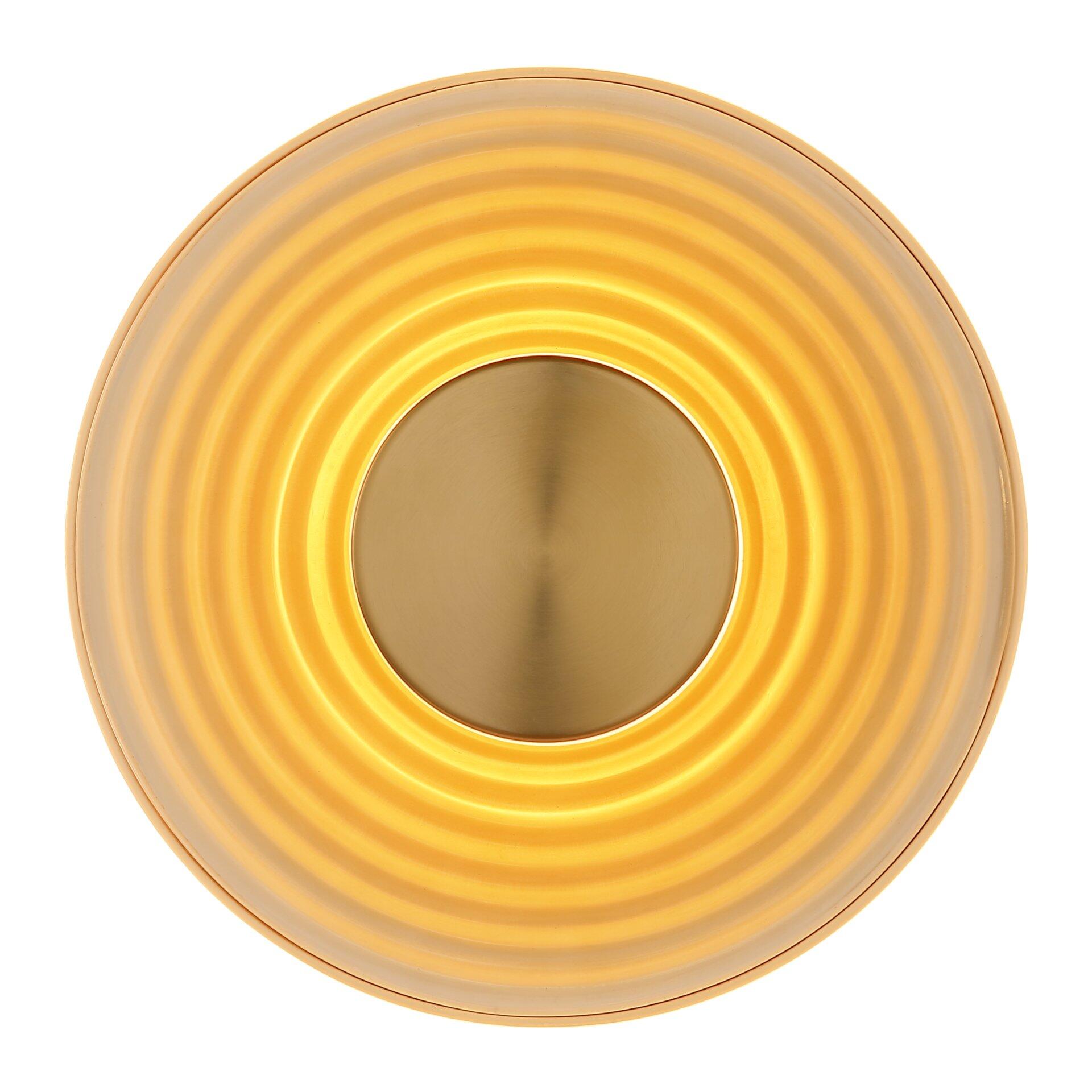 Wandleuchte JANELL mit gewellter Glasoberfläche, die ein gleichmäßiges, warmweißes Licht abstrahlt.