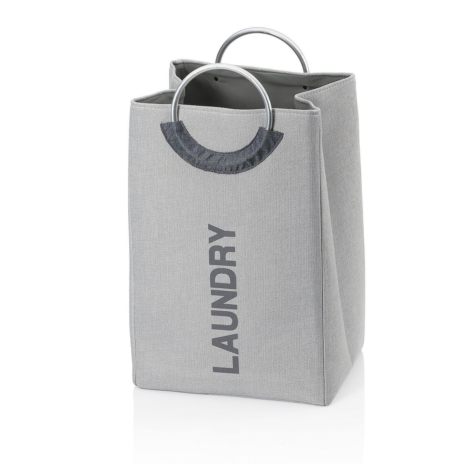 Grauer Wäschesack "Palma" mit vertikalem "LAUNDRY"-Aufdruck und Tragegriff, aus der Vogelperspektive dargestellt.