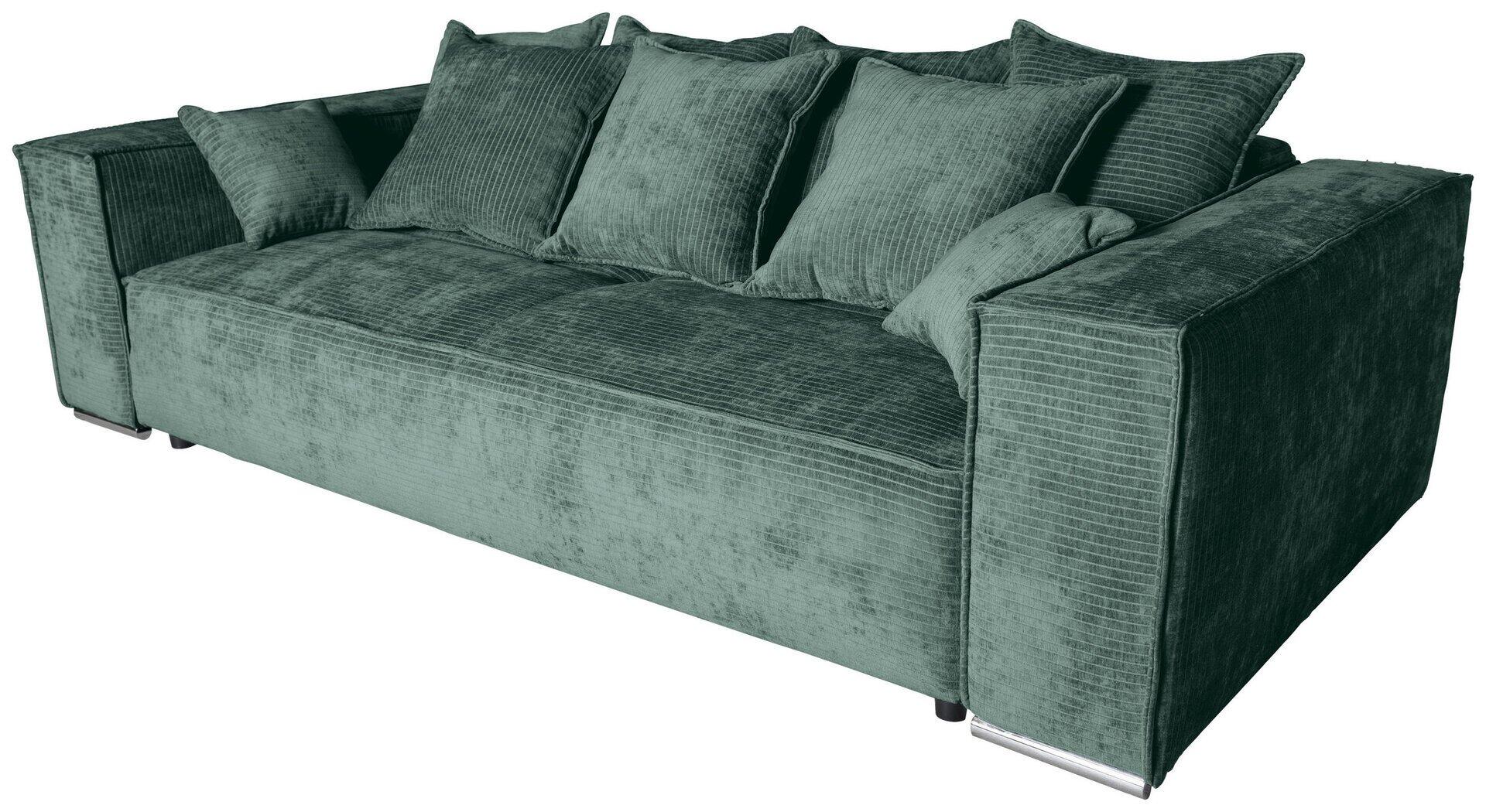 Bigsofa Sky: Grüne Eckcouch mit chromfarbenen Füßen, breiter Form, hohen Armlehnen und Zierkissen im Detail.