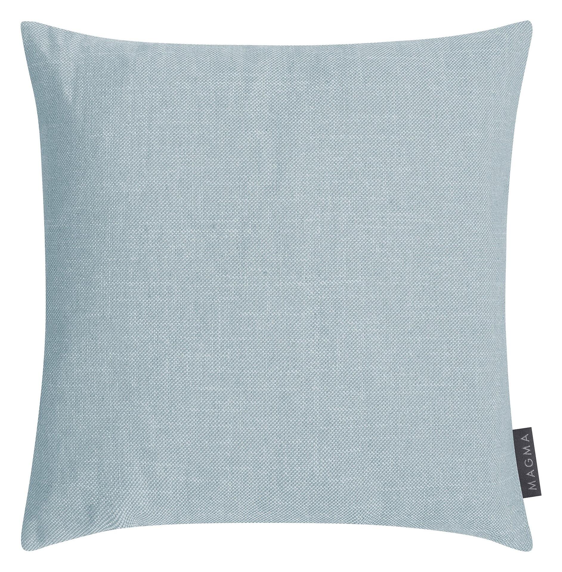 Hellblaues Kissen mit dezenter Jacquard-Struktur und unsichtbarem Reißverschluss, Details mit MAGMA-Etikett.