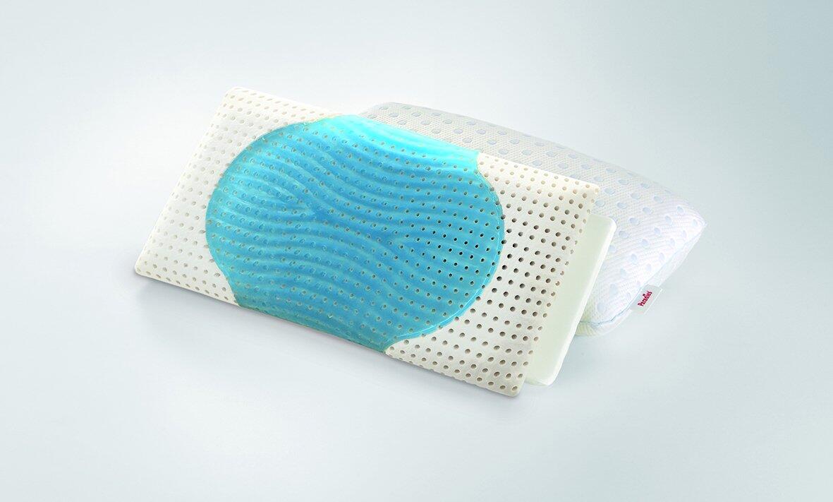 FlexoGel-Kissen Night mit gebogener Form und wellenförmiger Memory-Schaum-Struktur für optimale Stützkraft, präsentiert auf hellem Hintergrund.