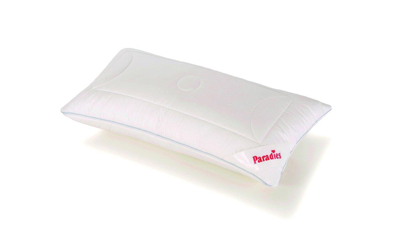 Weißes Softy Kissen, Softy Juna Duett, mit ergonomischer Vertiefung zur Kopfstütze und kleinem "Paradies"-Etikett.