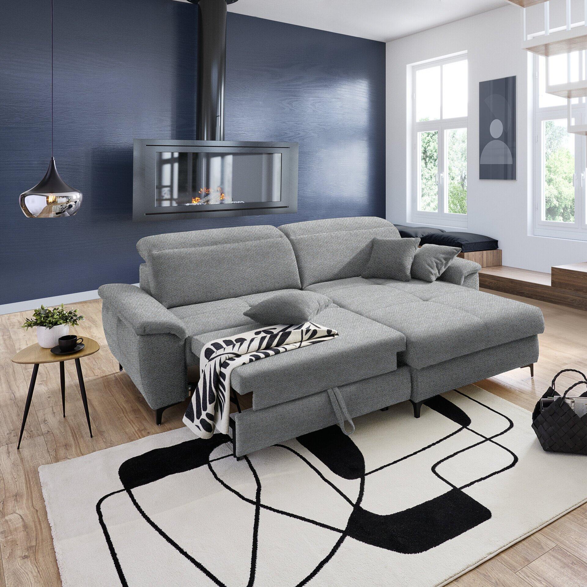 Retro Ecksofa mit ausgezogener Schlaffunktion und abklappbarer Kopfstütze, leicht erhöht fotografiert, in stilvollem Wohnzimmerambiente.