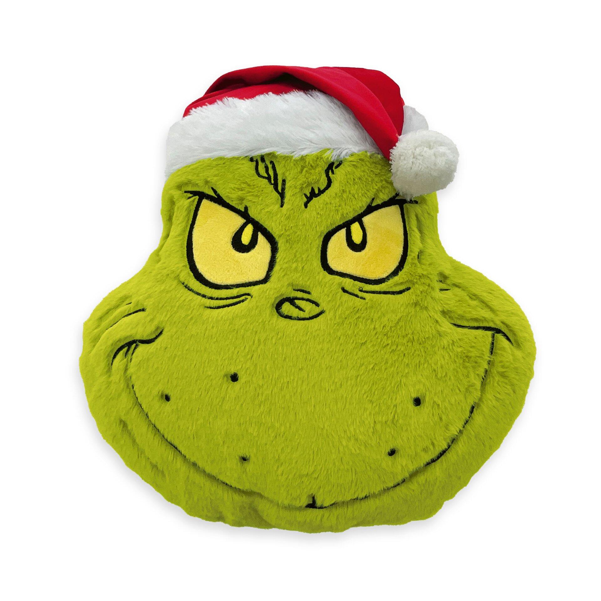Konturenkissen "Grinch" mit flauschigem, grünen Bezug und dem Gesicht des Grinch mit roter Mütze und schelmischem Grinsen.