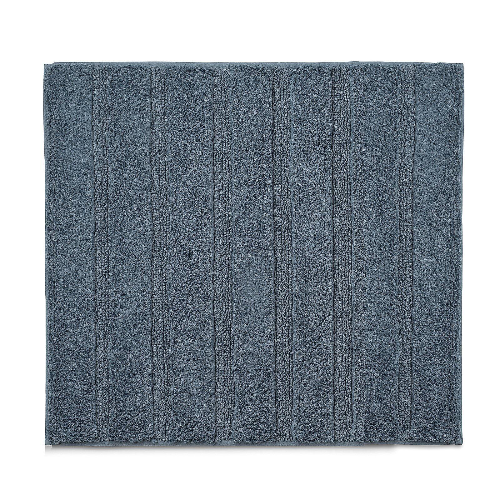 Quadratische Badematte Megan in blau-grau mit strukturierter, flauschiger Rippenoptik aus Vogelperspektive.