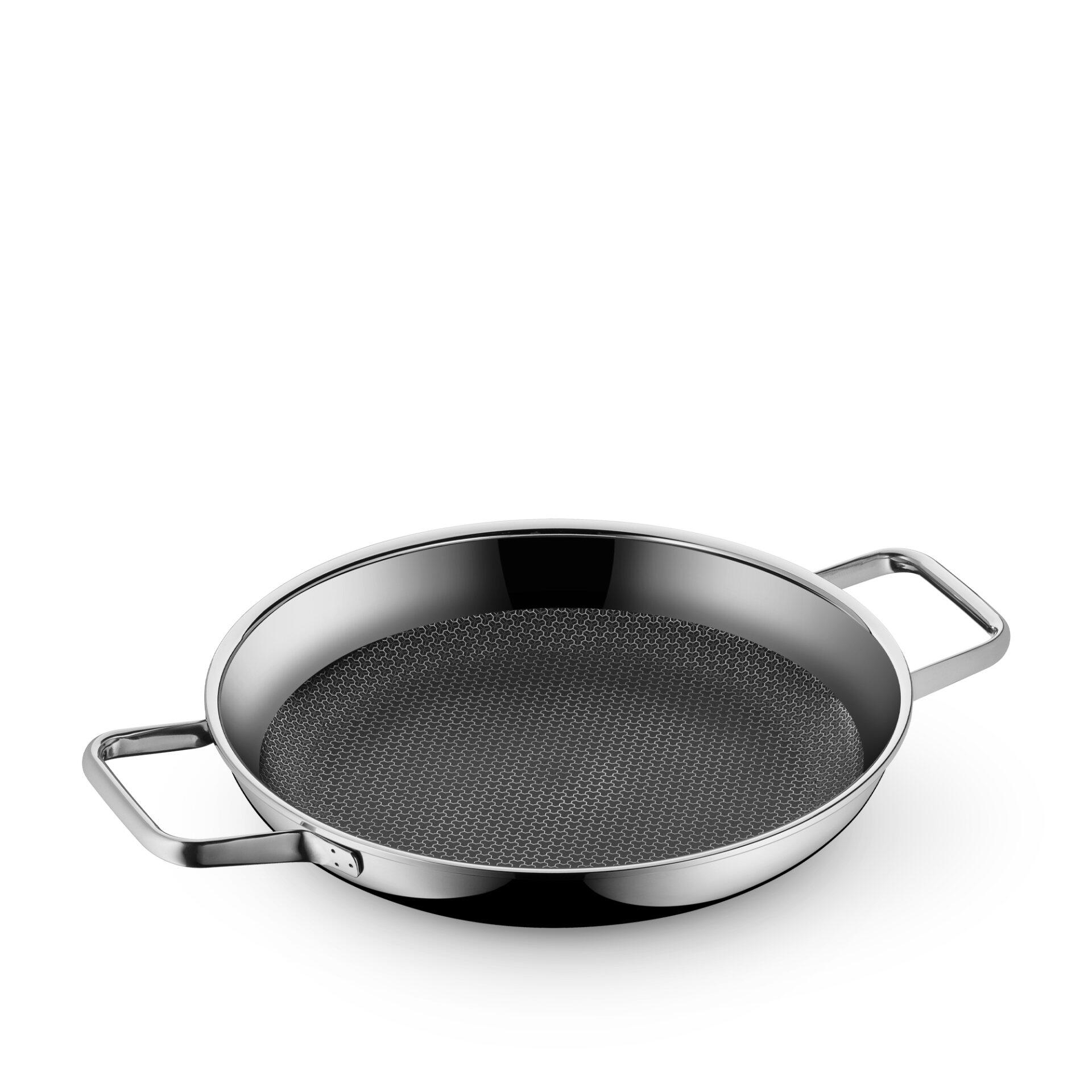 Servierpfanne Profi Resist Ø 28 cm von WMF mit zwei Griffen und strukturierter Antihaftbeschichtung, aus der Vogelperspektive erkennbar.