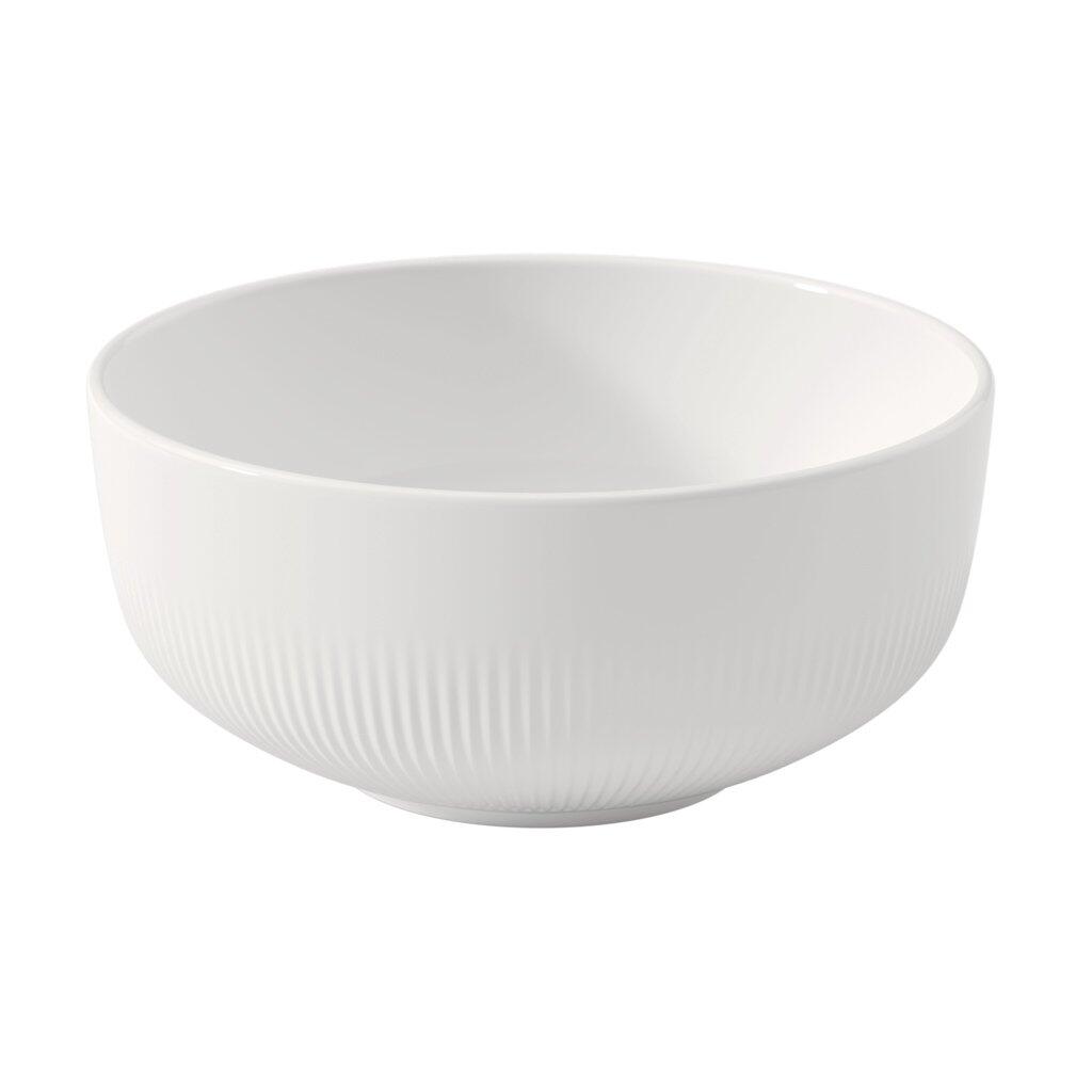 Weiße, rund geformte Schale Afina von Villeroy & Boch mit gewelltem Rand, aus der Vogelperspektive betrachtet.
