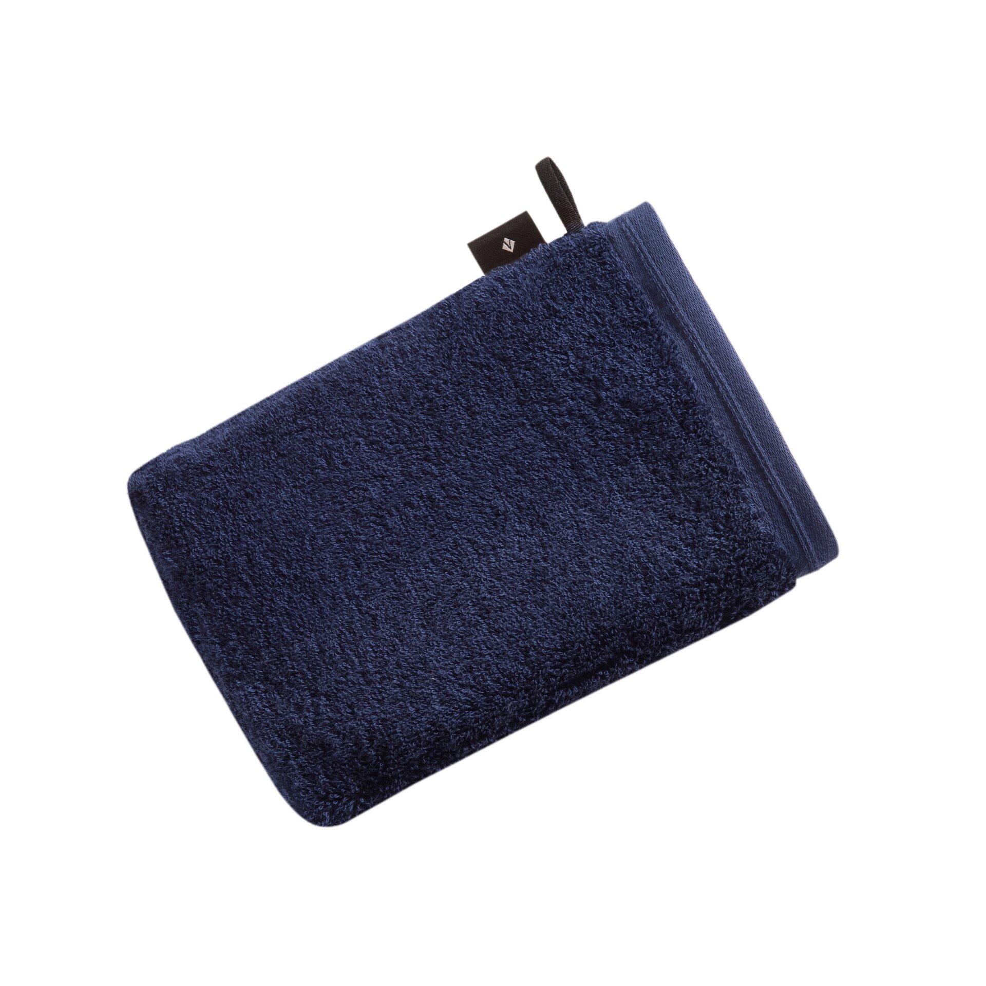 Blaues, sorgfältig gefaltetes Waschhandschuh "Vegan Life" aus 100% Baumwolle mit sichtbarem Etikett.