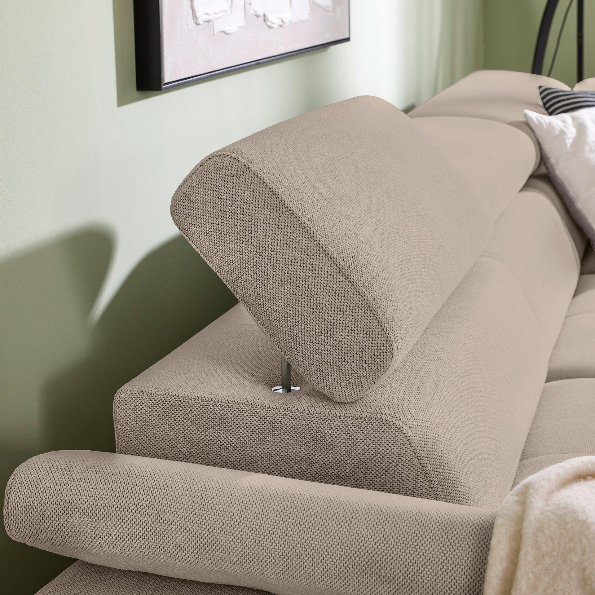 Ecksofa Combo mit abklappbaren Kopfstützen und verstellbaren Rückenlehnen, die einen wellenförmigen Effekt erzeugen.