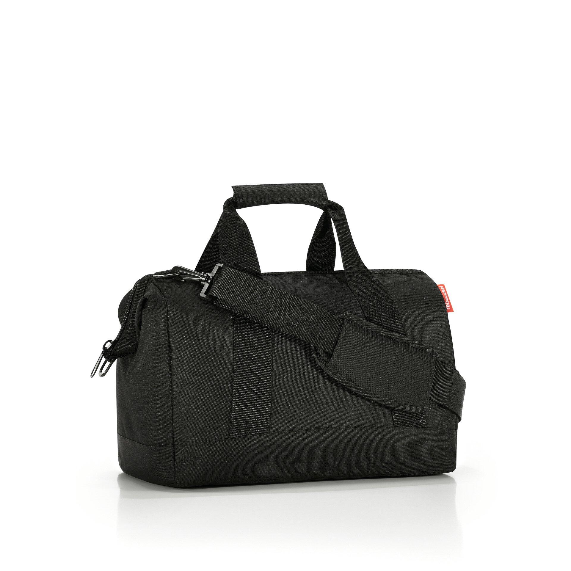 Reise-Koffer Allrounder m in Schwarz mit abnehmbarem Schultergurt und Tragegriff, aus der Seitenansicht.