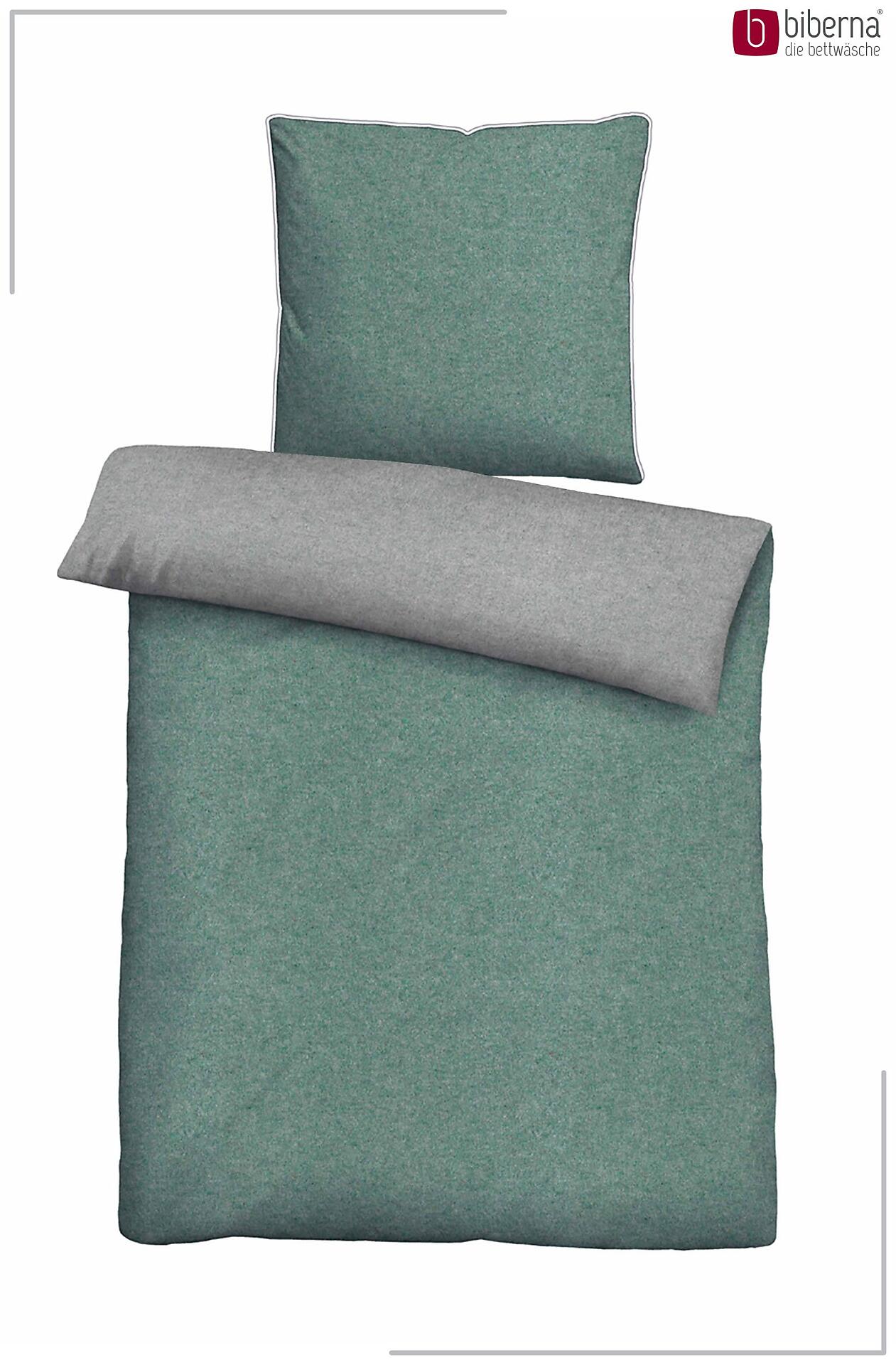 Bettwäsche-Set aus 100% Baumwolle mit hellem Grünton und Grau, zeigt eine detaillierte Produktansicht der strukturierten Oberfläche und Reißverschlusskonfektion.