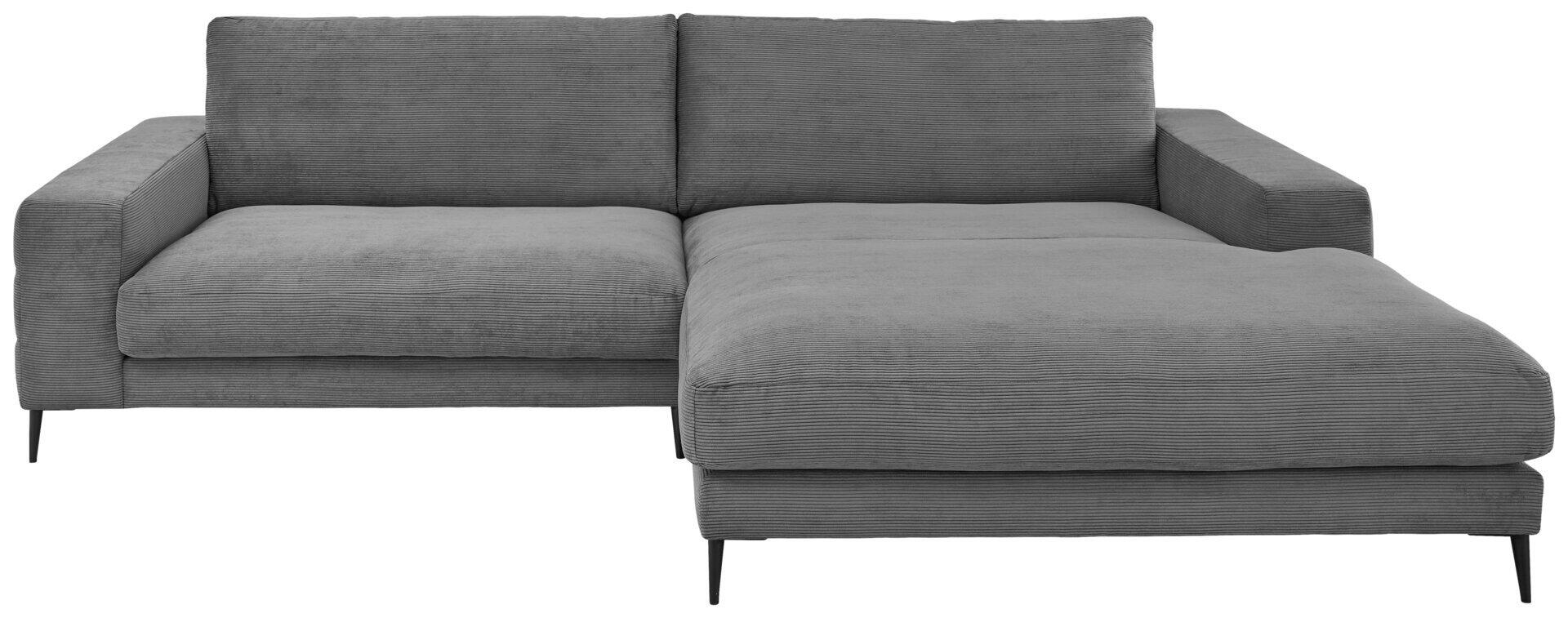 Eckcouch Badia Base 2.0 in Grau mit ausgezogener Liegefläche und schwarzem Metallfuß, fotografiert aus schräger Perspektive zur Darstellung der Sitz- und Liegefläche.