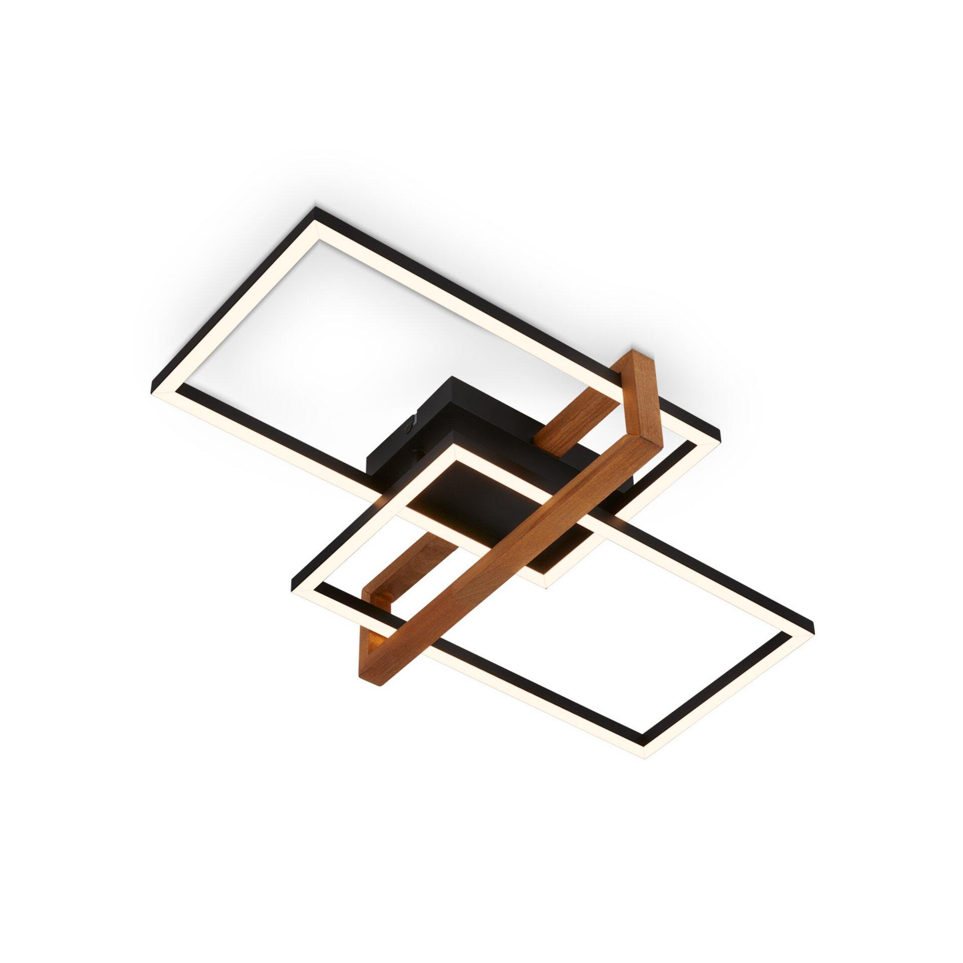 Detaillierte Draufsicht der Wand- und Deckenleuchte Nested mit übereinanderliegenden rechteckigen Elementen, einem schwarzen Rahmen, weißem Lichtfeld und einem zentralen, trapezförmigen Holzelement.