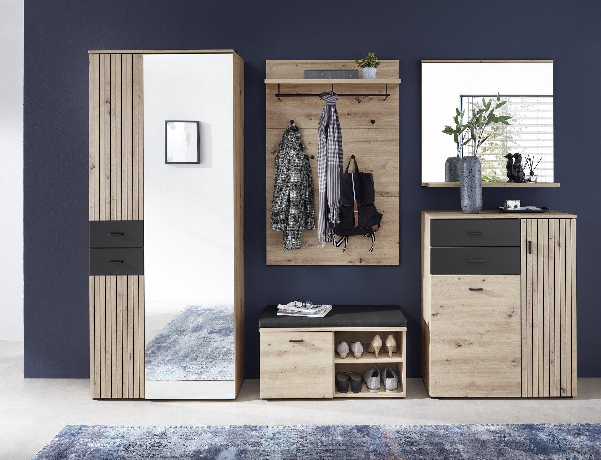Garderoben-Kombi Buffalo mit Artisan Eiche Optik, integriertem Spiegel und Schuhschrank, zeigt eine Möbelfront mit vertikalen Lamellen und zwei Schubladen.