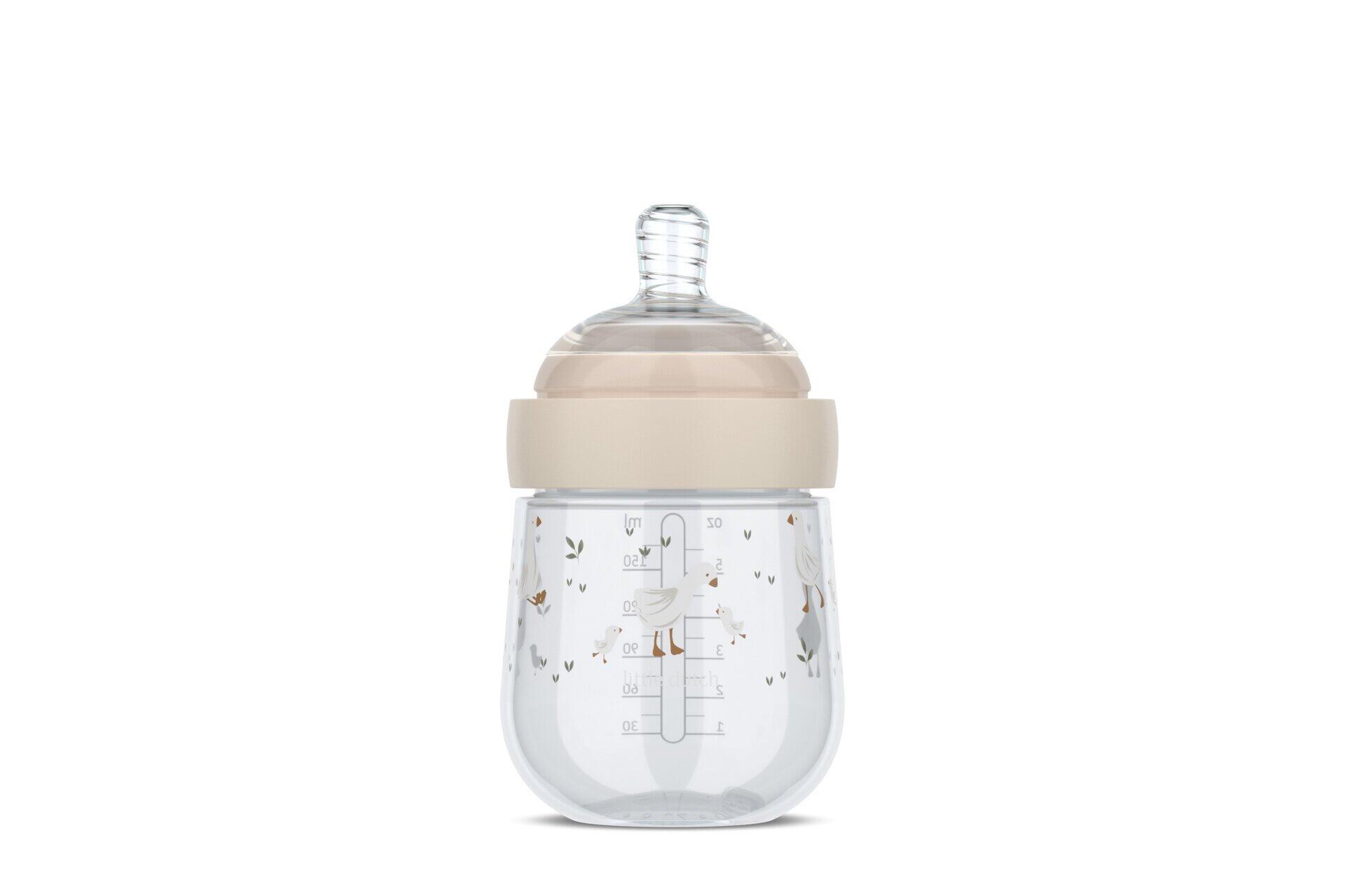 Babyflasche Mio Baby, Mio im Profil mit Millilitermarkierungen und cremefarbenem Deckel und Griff.
